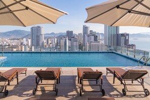 Outdoor pool, open 9:00 AM to 4:30 PM, pool umbrellas, sun loungers