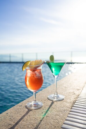 Outdoor pool, open 9:00 AM to 4:30 PM, pool umbrellas, sun loungers