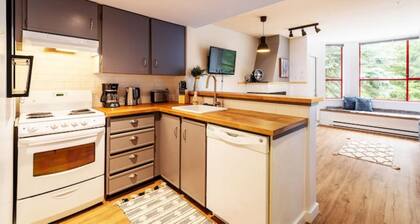 Cozy Creekside Two-Storey Condo