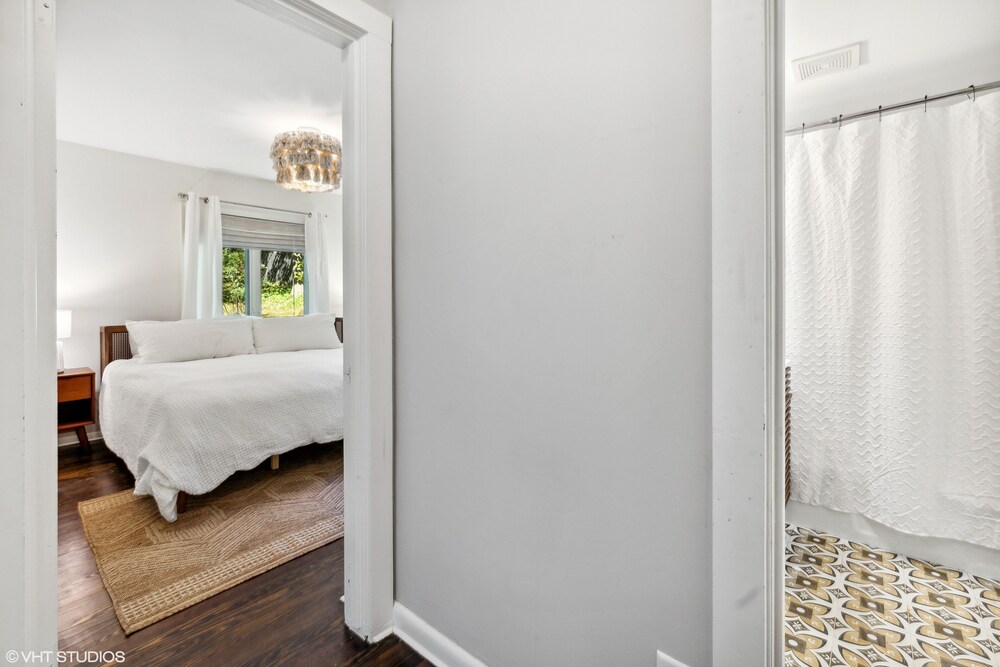 newly renovated home in coveted Duneland Beach. View of water