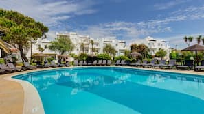 Indoor pool, outdoor pool, pool umbrellas, pool loungers