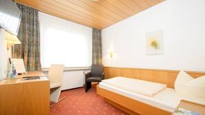 Hypoallergeen beddengoed, een bureau, verduisterende gordijnen
