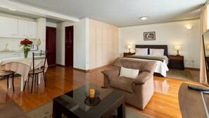 Flat-screen TV, DVD player, pay movies