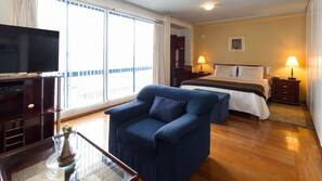 Flat-screen TV, DVD player, pay movies