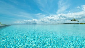 Outdoor pool, open 10:00 AM to 7:00 PM, free pool cabanas