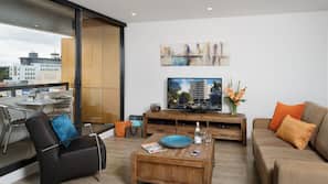 50-inch flat-screen TV with cable channels, TV
