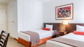 Minibar, coffre-forts dans les chambres, bureau, rideaux occultants