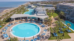 Seasonal outdoor pool, pool umbrellas, sun loungers