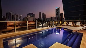 Outdoor pool, open 6 AM to 10 PM, sun loungers