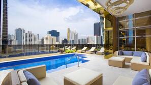 Outdoor pool, open 6 AM to 10 PM, sun loungers