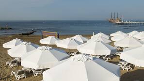 Private beach nearby, sun loungers, beach umbrellas