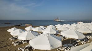 Private beach nearby, sun loungers, beach umbrellas