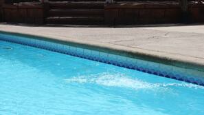 Outdoor pool, pool umbrellas, pool loungers