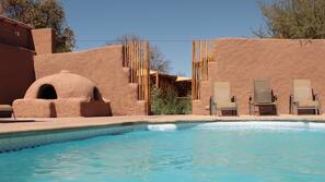 Outdoor pool, pool umbrellas, pool loungers