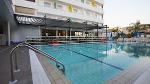 Seasonal outdoor pool, open 8 AM to 7 PM, pool umbrellas, sun loungers