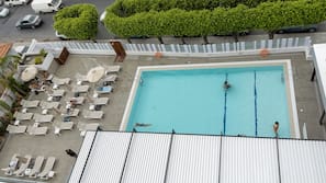 Seasonal outdoor pool, open 8 AM to 7 PM, pool umbrellas, sun loungers