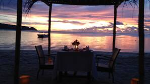 On the beach, white sand, sun loungers, snorkeling