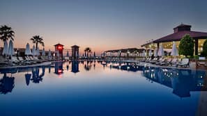 Outdoor pool, pool umbrellas, pool loungers