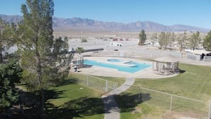Seasonal outdoor pool, pool umbrellas, sun loungers