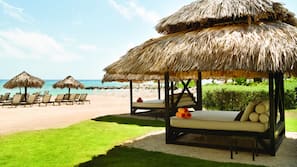 Private beach, white sand, sun loungers, beach umbrellas