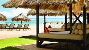 Private beach, white sand, sun loungers, beach umbrellas