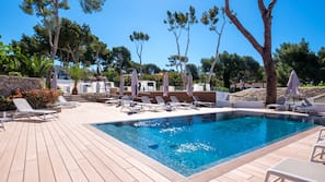 Indoor pool, outdoor pool, pool umbrellas, pool loungers