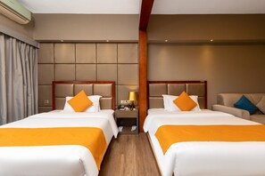 Deluxe Twin Room, 2 Twin Beds | Minibar, in-room safe, desk, blackout drapes