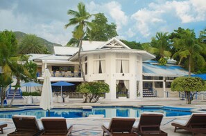 Outdoor pool, cabanas (surcharge), pool umbrellas