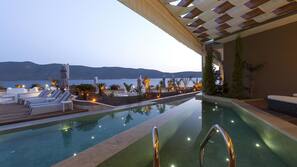 Indoor pool, seasonal outdoor pool, pool umbrellas, sun loungers