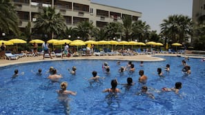 2 outdoor pools, pool umbrellas, pool loungers