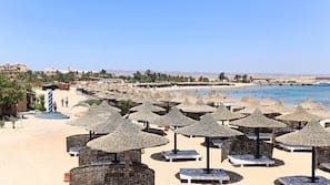 Private beach, sun-loungers, beach umbrellas, beach bar
