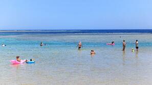 Private beach, sun-loungers, beach umbrellas, beach bar