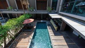 Outdoor pool, pool umbrellas, pool loungers