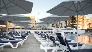 Seasonal outdoor pool, pool umbrellas, sun loungers