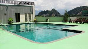 Outdoor pool, pool loungers