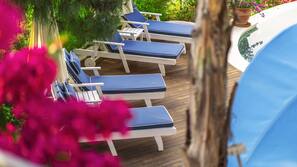 2 outdoor pools, pool umbrellas, pool loungers