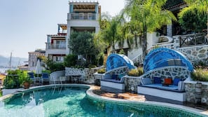 2 outdoor pools, pool umbrellas, pool loungers