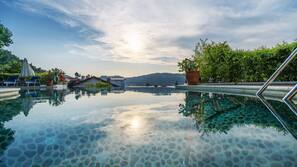 2 outdoor pools, pool umbrellas, pool loungers