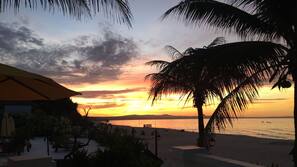 Private beach, white sand, sun loungers, beach umbrellas
