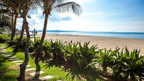 Private beach, white sand, sun loungers, beach umbrellas