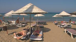 Private beach, free beach cabanas, sun-loungers, beach umbrellas