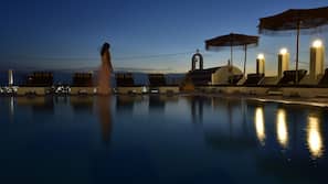 Seasonal outdoor pool, open 9 AM to 9 PM, pool umbrellas, pool loungers