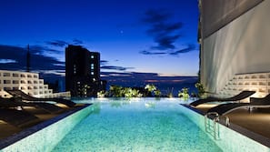 Outdoor pool, pool umbrellas, pool loungers