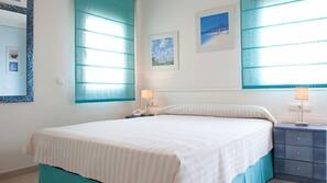 Ropa de cama de alta calidad y cortinas opacas