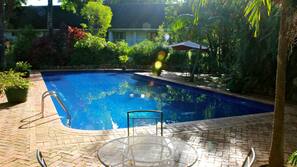 2 outdoor pools, pool umbrellas, pool loungers