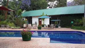 2 outdoor pools, pool umbrellas, pool loungers