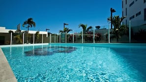 Outdoor pool, pool umbrellas, sun loungers