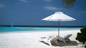 Private beach, white sand, free beach cabanas, sun loungers