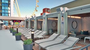 Seasonal outdoor pool, cabanas (surcharge), pool umbrellas