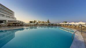 Seasonal outdoor pool, pool umbrellas, pool loungers